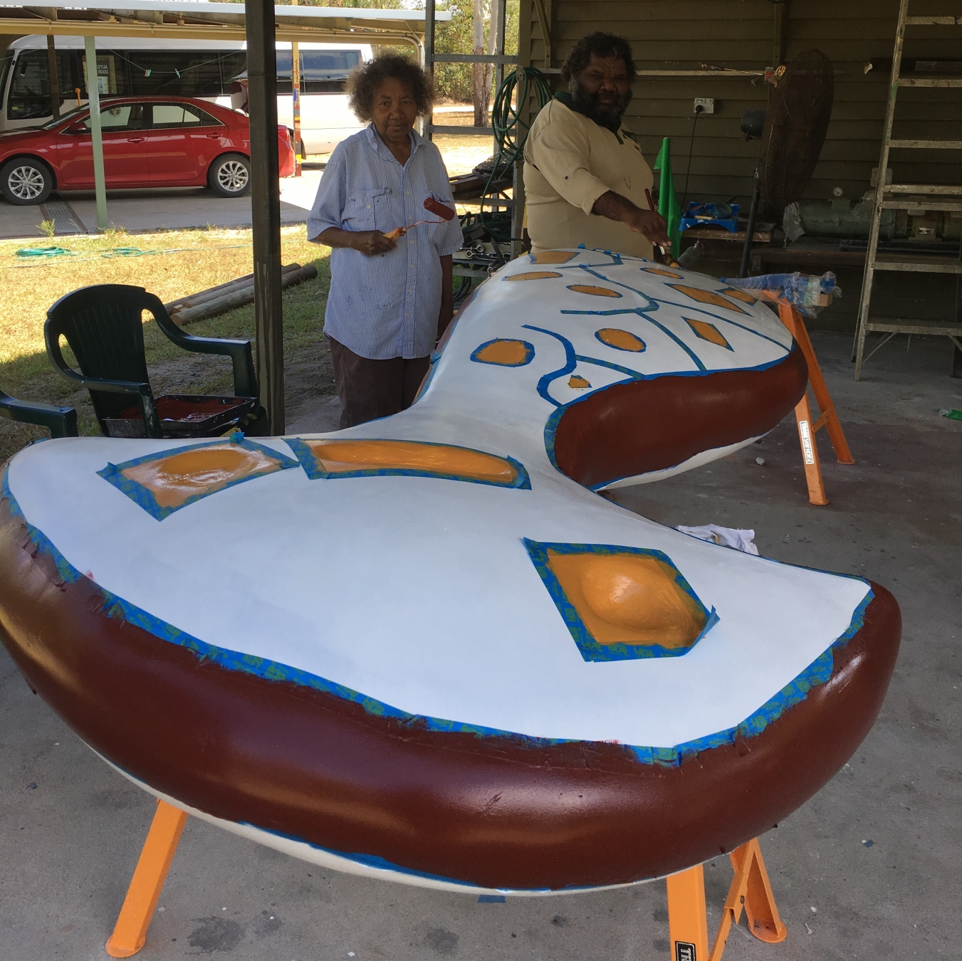 two artists making an artwork